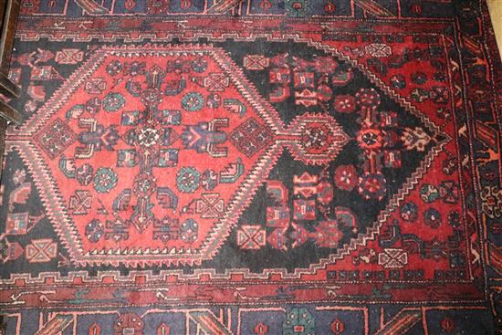 Persian red ground rug